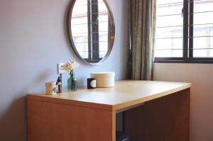 a dressing table with a mirror in a room at GRAYHAUS 32 Spacious 3 Storey 5BR - Bandar Utama, near 1 Utama - Stay Only NO EVENTS in Petaling Jaya +44 photos