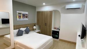 Televisor o centre d'entreteniment de FIRST Studio Hotel Da Nang