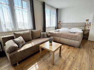 Postel nebo postele na pokoji v ubytování Smarty Choice Flat with Deluxe Kitchen