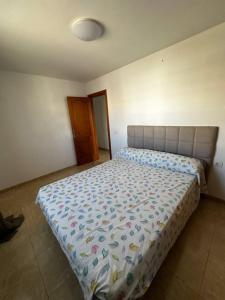 Ένα ή περισσότερα κρεβάτια σε δωμάτιο στο Buzanada Charming Rooms