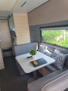 Posezení v ubytování Victoria FKK Camping Bunculuka