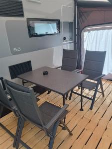 Posezení v ubytování Victoria FKK Camping Bunculuka