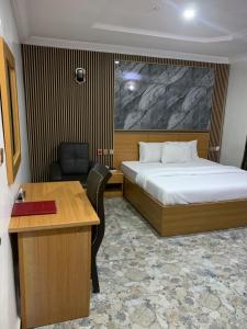 Havilah Towers Hotel Ltd客房内的一张或多张床位