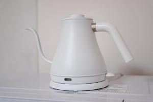 a white blender sitting on top of a counter at Tokyo Stay Akasaka in Tokyo