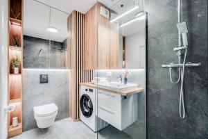 Koupelna v ubytování Rent Invest - Braniborska Apartament Parking Klimatyzacja + 4 fotografie