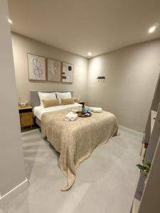Ένα ή περισσότερα κρεβάτια σε δωμάτιο στο B&B De Amsterdamse Poort