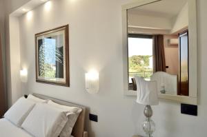 A bed or beds in a room at EGO' Marine