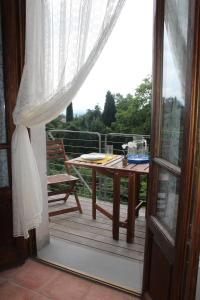 A balcony or terrace at Lady Frantoio Toscano