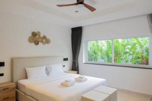 Voodi või voodid majutusasutuse Luxurious 3br Villa Malina Sea & Jungle Views toas +21 fotot