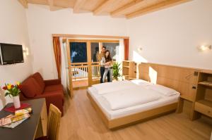 Ένα ή περισσότερα κρεβάτια σε δωμάτιο στο Hotel Pider