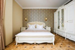 Postel nebo postele na pokoji v ubytování Hotel Saint Germain