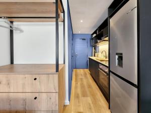 Kuchyň nebo kuchyňský kout v ubytování Stylish Sea Point Studio