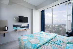 Кровать или кровати в номере ROKET ROOM Majestic By Reccoma +29 фотографий