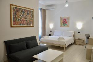 A bed or beds in a room at EGO' Marine