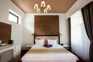 Postel nebo postele na pokoji v ubytování Hotel Saint Germain