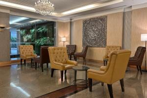 Posezení v ubytování Rembrandt Residences Bangkok