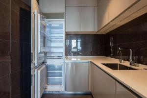 Η κουζίνα ή μικρή κουζίνα στο 故渝里-两室一卫 +6 φωτογραφίες