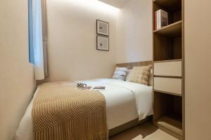 Ένα ή περισσότερα κρεβάτια σε δωμάτιο στο 故渝里-两室一卫