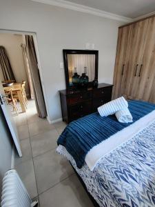 Ένα ή περισσότερα κρεβάτια σε δωμάτιο στο Private luxury 3 Bedroom Home