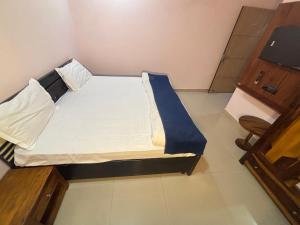 Postel nebo postele na pokoji v ubytování Hotel D7