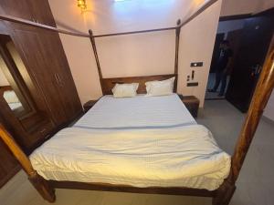 Postel nebo postele na pokoji v ubytování Hotel D7