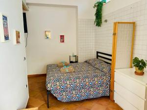 Postel nebo postele na pokoji v ubytování Il Giardino di Rosa & Elino