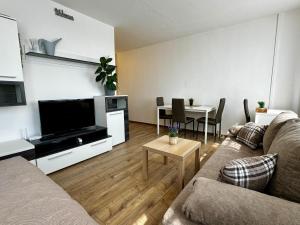 TV a/nebo společenská místnost v ubytování Smarty Choice Flat with Deluxe Kitchen