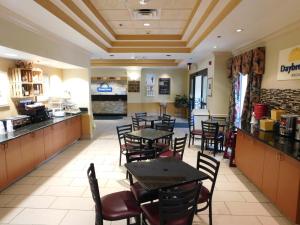 A restaurant or other place to eat at Days Inn & Suites by Wyndham Cedar Rapids