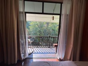 Balkón nebo terasa v ubytování Villa Kuala Woh Resort