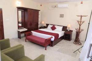Rúm í herbergi á Hillview Beach Resort