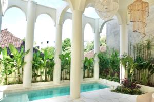 Πισίνα στο ή κοντά στο Djati Retreat Pandawa