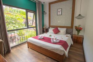 Postel nebo postele na pokoji v ubytování NT Elysian hotel + 37 fotografií