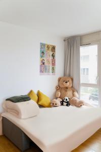 Postel nebo postele na pokoji v ubytování Studio proche de Disneyland Paris