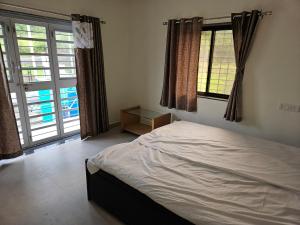 Imagem da galeria de Rolling Hills em Nashik mais 1 fotografia