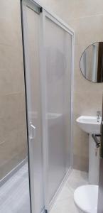 a bathroom with a shower and a sink at appartement proche de l aéroport a Tanger in Tangier