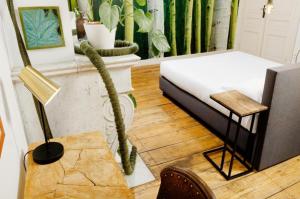 Un pat sau paturi într-o cameră la B&B DRUUM