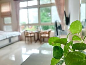 Postel nebo postele na pokoji v ubytování 花蓮統一的家民宿The home place