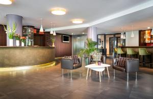 Zona de estar de Stadthotel am Römerturm
