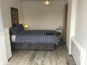 Letto o letti in una camera di Divine Mercy B&B