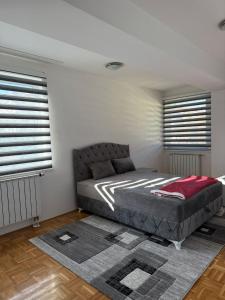 Postel nebo postele na pokoji v ubytování Apartman Relax + 9 fotografií
