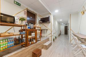 Kuchyň nebo kuchyňský kout v ubytování 7A Hostal