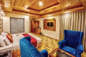 Ruang duduk di Hotel Mountain face by Snow City Hotels