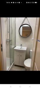 Koupelna v ubytování Dom Gościnny Koliber nad morzem w Darłówku