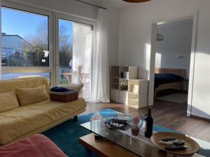Χώρος καθιστικού στο Ferienwohnung Zum Kiessee