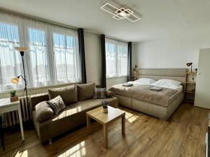 Posezení v ubytování Smarty Choice Flat with Deluxe Kitchen