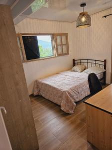 Ένα ή περισσότερα κρεβάτια σε δωμάτιο στο Appartement Sainte Marie 4 chambres, magnifique vue