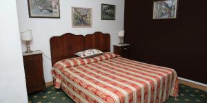 Postel nebo postele na pokoji v ubytování Bridge Hotel