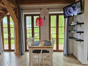 TV a/nebo společenská místnost v ubytování Hof am Meer "Seeadler"