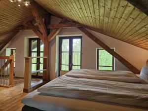 Postel nebo postele na pokoji v ubytování Hof am Meer "Seeadler"