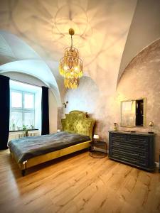 Ένα ή περισσότερα κρεβάτια σε δωμάτιο στο VIP Apartmány Villa Regia